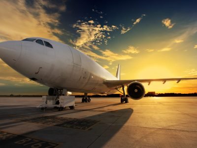 Airplane at sunset - back lit